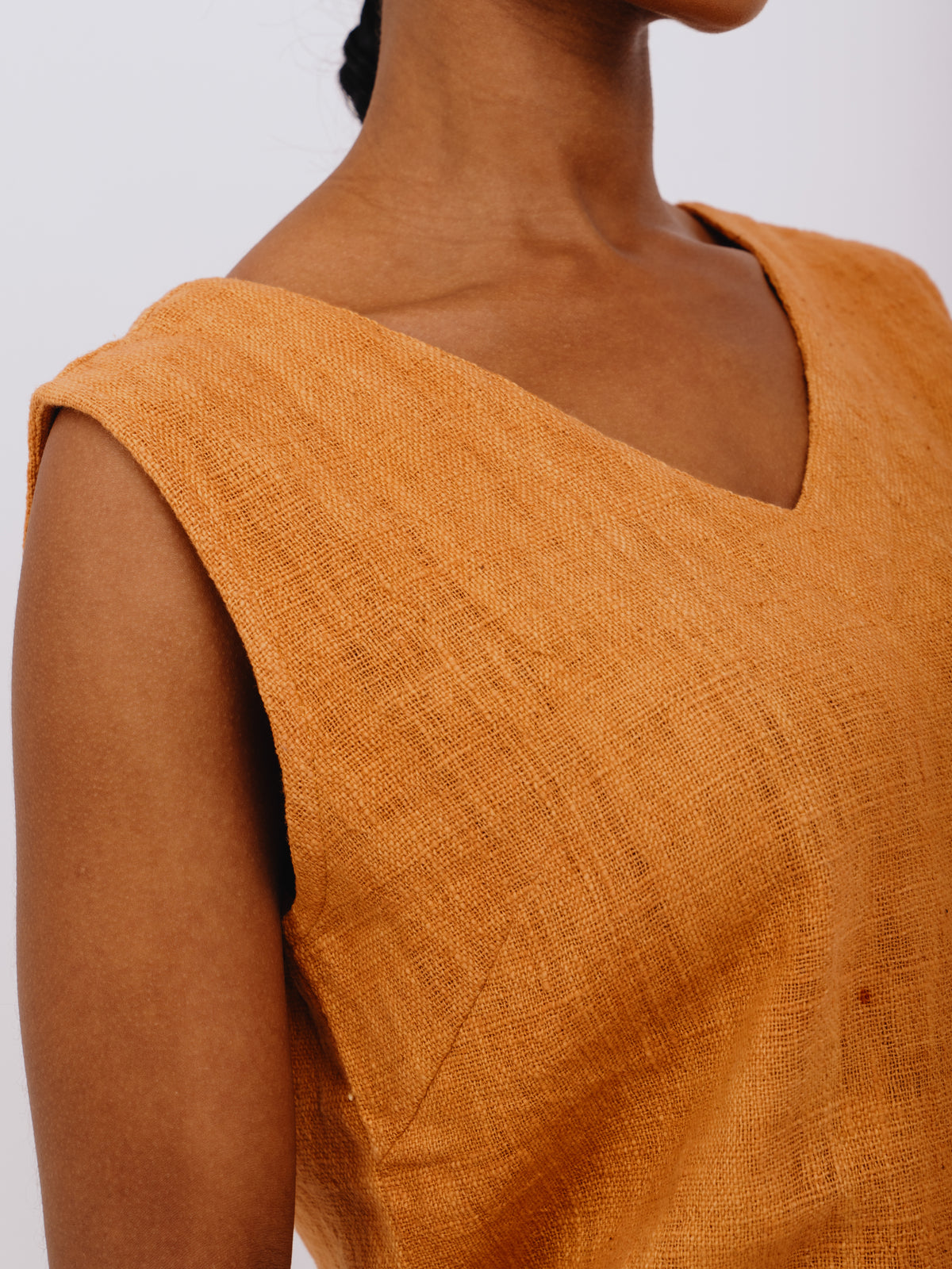 A V- neck Sleeveless Rust Orange top